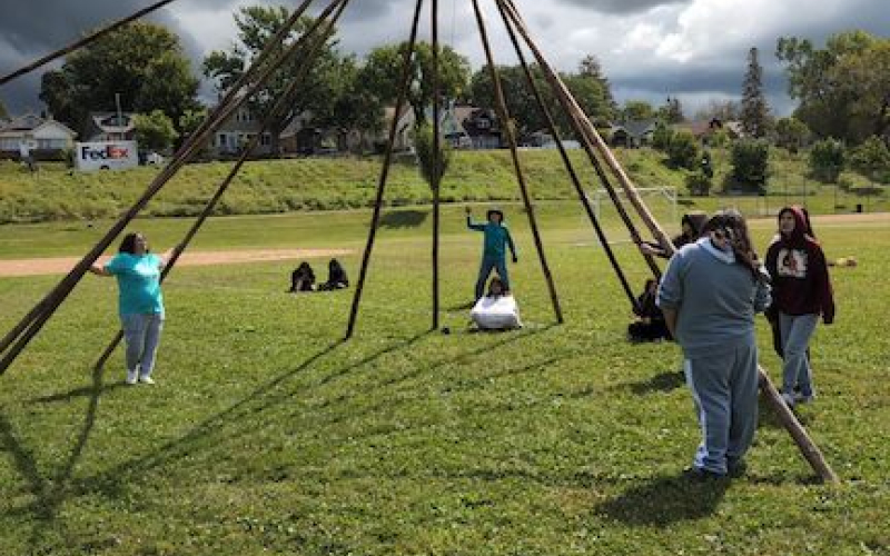 photo of teepee and storm coming