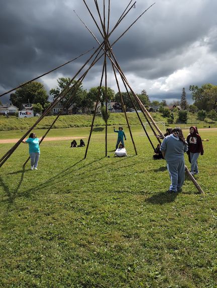 photo of teepee and storm coming